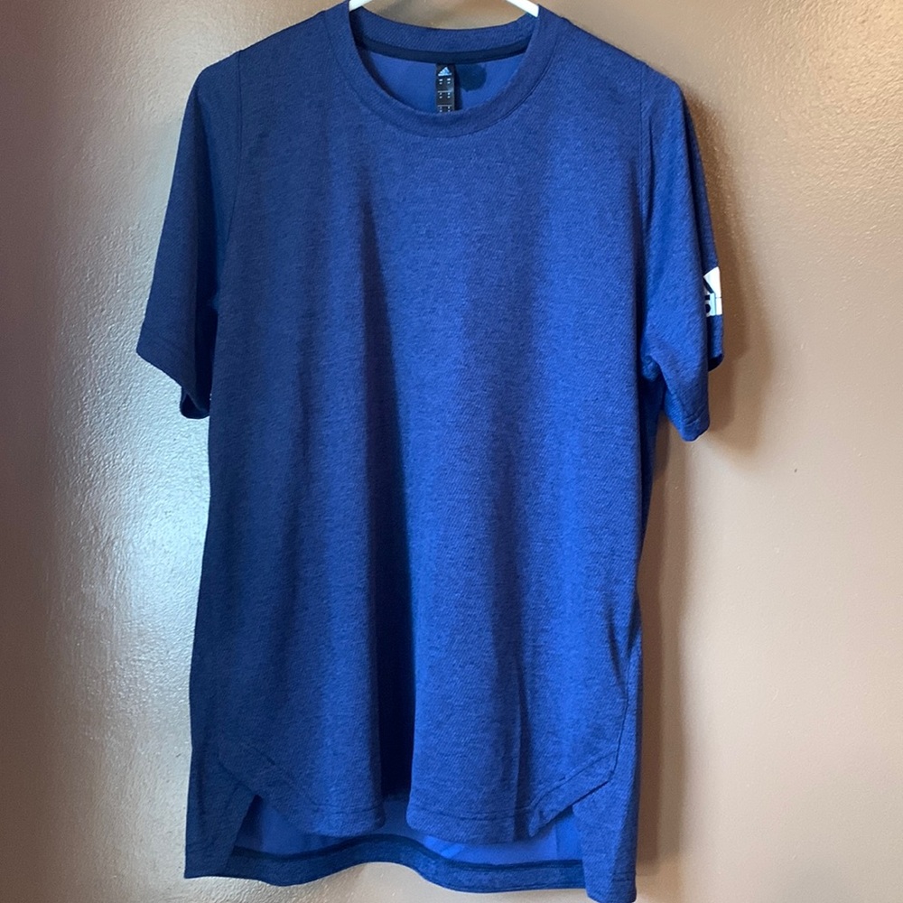 Mens adidas shirt. Size medium. New, although a small stain on back collar.